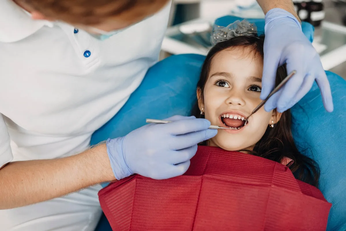 Child having a dental cleaning at a pediatric dentist office