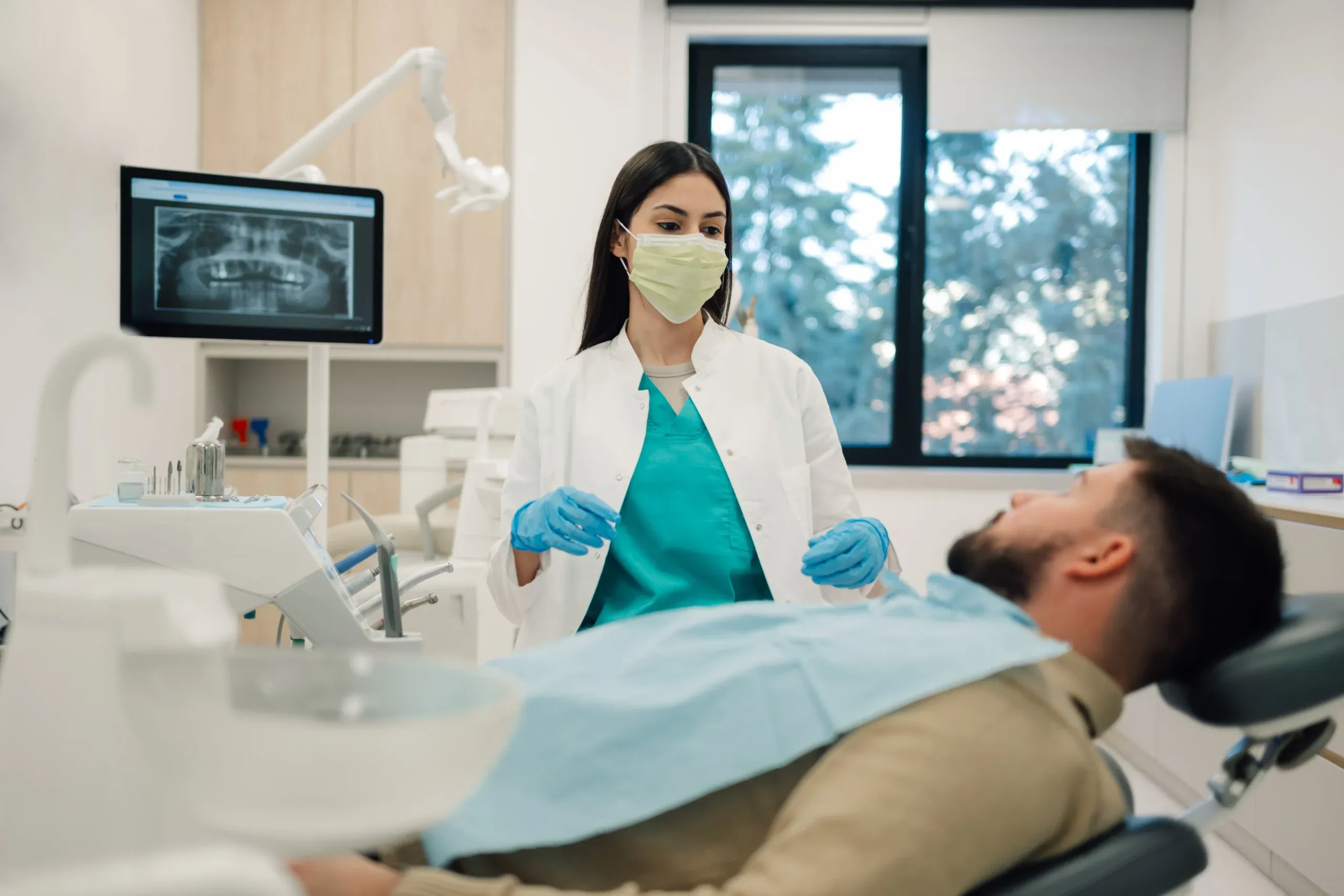 Calm, comfortable patient in a modern dental office chair