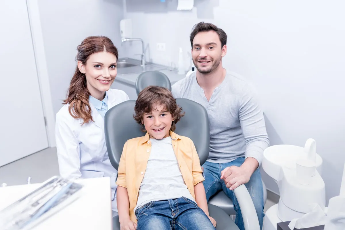 Happy family at dental clinic